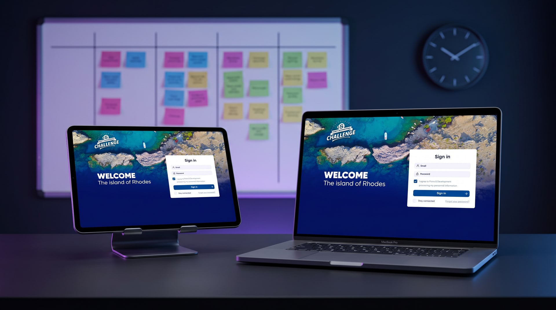 Point S Rhodes registration web app on a laptop and tablet in front of a project timeline board